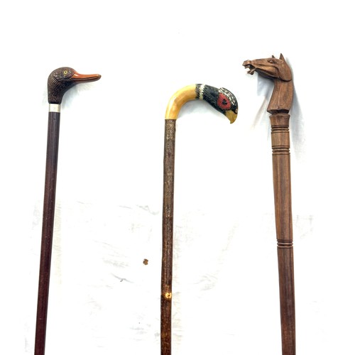 132 - Selection of 3 vintage wooden walking sticks, with animal feature handles, pheasant, horse and duck