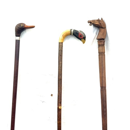 132 - Selection of 3 vintage wooden walking sticks, with animal feature handles, pheasant, horse and duck