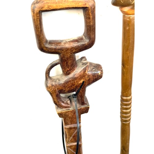 131 - Selection of 3 carved African tribal walking sticks includes Makonde hand crafted etc