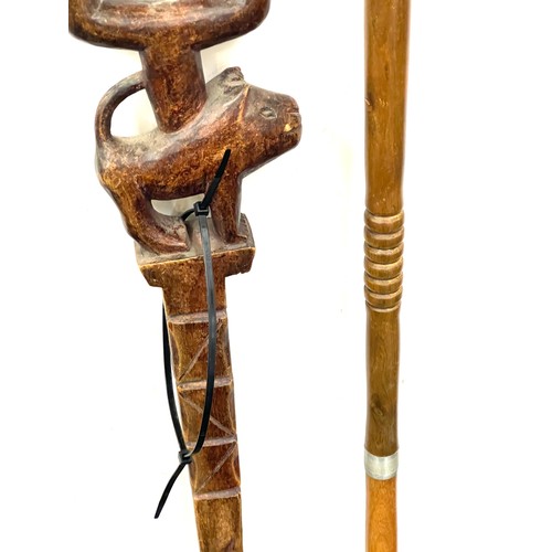 131 - Selection of 3 carved African tribal walking sticks includes Makonde hand crafted etc