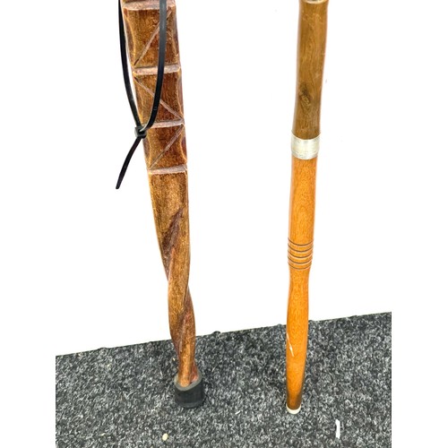 131 - Selection of 3 carved African tribal walking sticks includes Makonde hand crafted etc