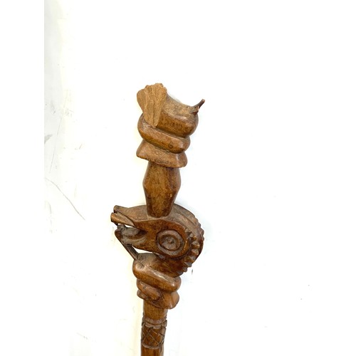 136 - vintage Carved tribal double head stick and 1 other