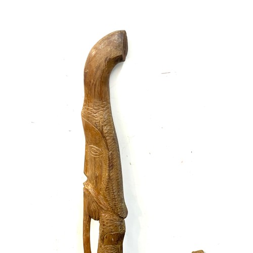 136 - vintage Carved tribal double head stick and 1 other