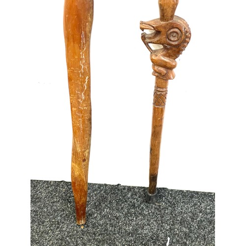 136 - vintage Carved tribal double head stick and 1 other