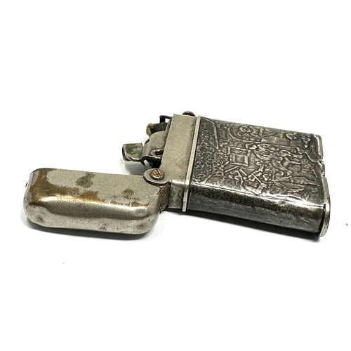 39 - Vintage Thorens silver lighter, a rare Swiss claw lighter marked 935 with repousse work to sides