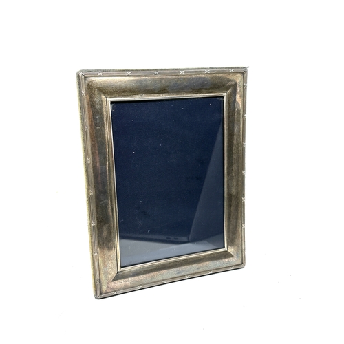 55 - Vintage silver picture frame measures approx 22.5cm by 17.5cm