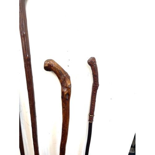 138 - 4 Vintage carved walking sticks includes shooting stick etc