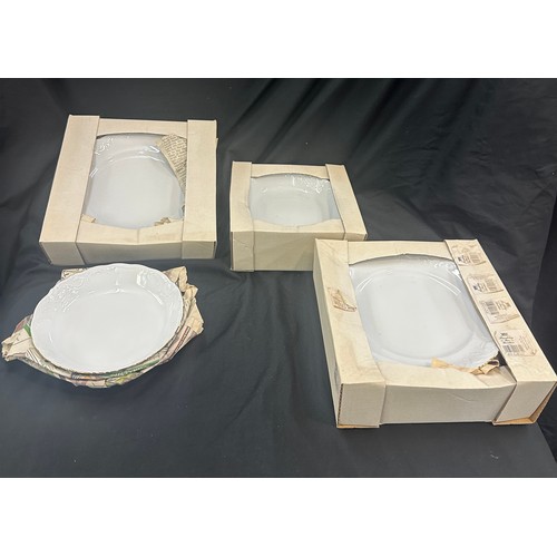 199 - Rockley porcelain china, made in poland, includes 9 dinner plates, dessert bowls, 12 side plates, 9 ... 