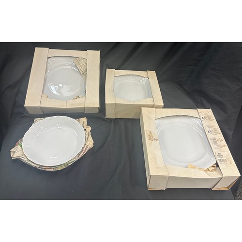 199 - Rockley porcelain china, made in poland, includes 9 dinner plates, dessert bowls, 12 side plates, 9 ... 