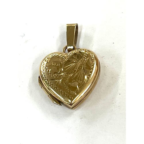 428 - 9ct gold heart locket pendant, approximate weight 1.8g