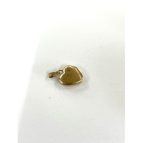 428 - 9ct gold heart locket pendant, approximate weight 1.8g