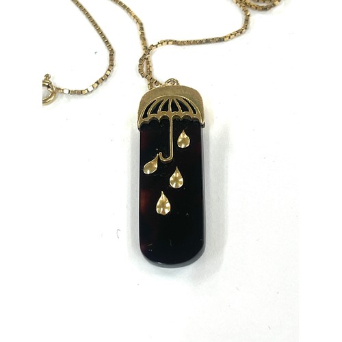 423 - Vintage 9ct gold pendant and chain gross weight 7.4g, Umbrella and raindrop design