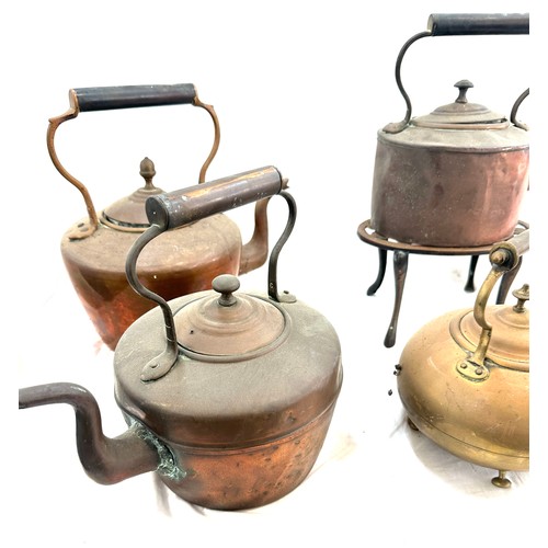 117 - Selection of vintage copper and brass kettles with one stand