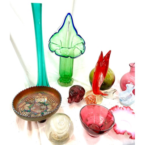 110 - Large selection of coloured glassware to include fish paperweight, carnival glass, cranberry etc