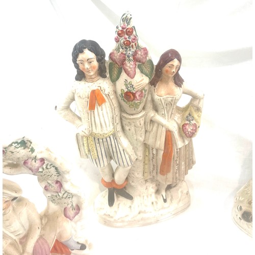 98 - 4 Antique Staffordshire figures, tallest measures approximately: 17.5 inches