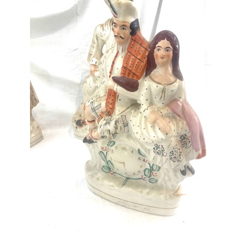 98 - 4 Antique Staffordshire figures, tallest measures approximately: 17.5 inches