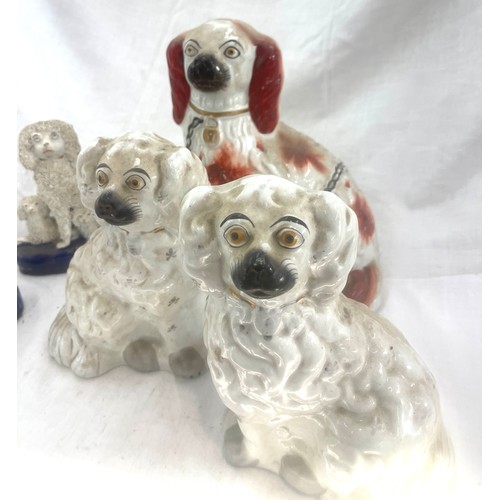 167 - 5 Antique Staffordshire dog figures, tallest measures approximately: 8.5 inches