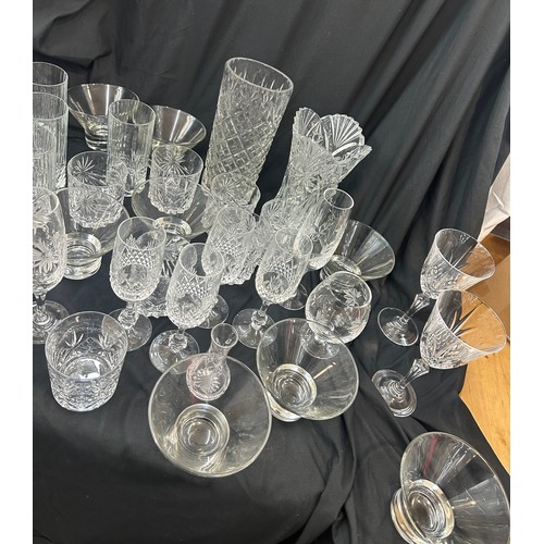 213 - Large selection of glassware to include vase, glasses etc