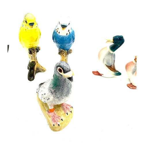 344 - 3 John Beswick figures includes 2 parrots and a pigeon and 3 others