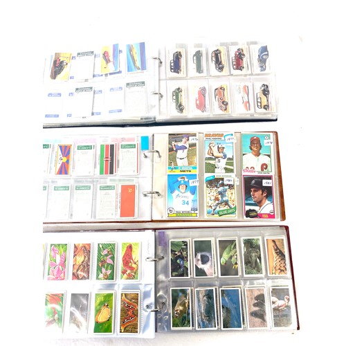 88 - Selection of cigarette/ tea/ collectors cards in three albums includes full sets includes players, w... 