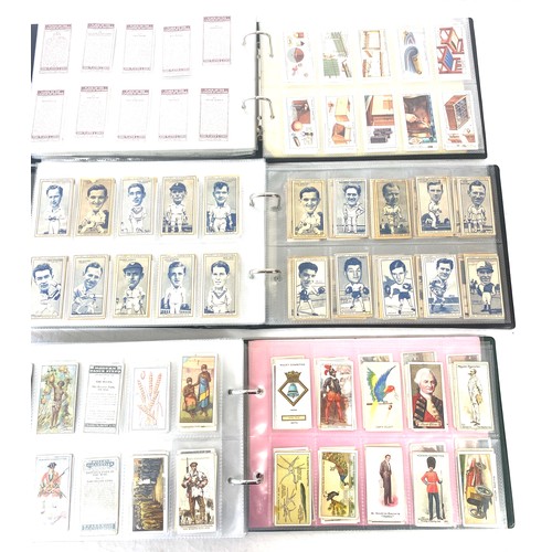 72 - Selection of cigarette/ tea/ collectors cards in three albums includes full sets includes players, w... 