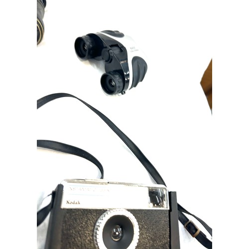 23 - Selection of assorted binoculars and a Kodak camera