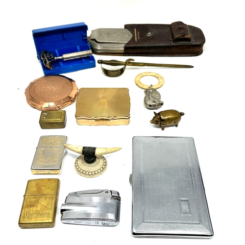 539 - selection of misc items inc compacts boxed razors zippo lighters etc