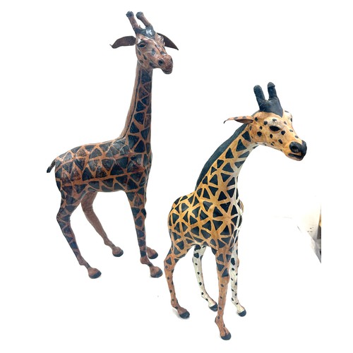 94 - 2 leather giraffe figures, tallest measures approximately 21 inches tall