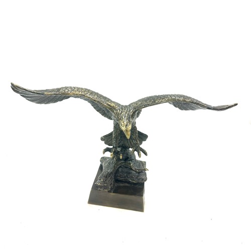 336 - Brass eagle figure, 8 inches tall 13 inches wide