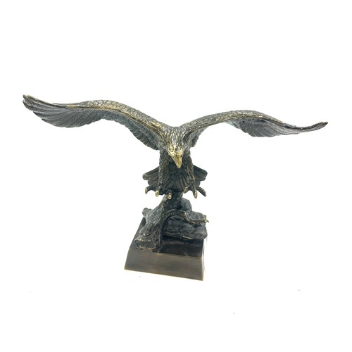 336 - Brass eagle figure, 8 inches tall 13 inches wide