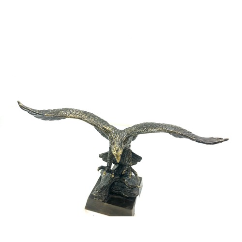 336 - Brass eagle figure, 8 inches tall 13 inches wide