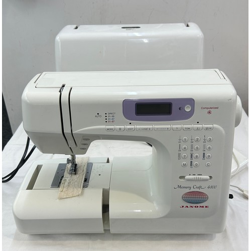 335 - Janome Memory craft 4800 sewing machine, computerised, Model MC 4800, untested with cabinet and sewi... 