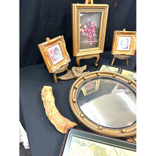 143 - Selection of collectable items to include Eagle mirror, place mats, stands etc