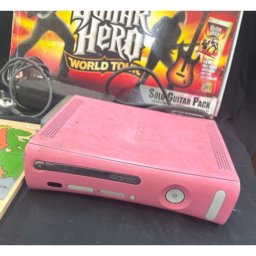 124 - Selection of gaming items to include pink xbox 360 guitar hero and puzzles - all untested