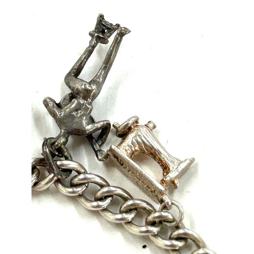 374 - Vintage silver charm bracelet total weight 32 grams