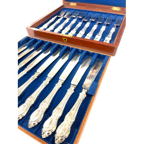 10 - Vintage wooden boxed silver plated fish knife and forks