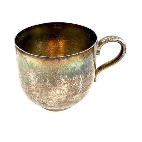 307 - Unmarked silver mug, engraved MCS, approximate weight 132g, Height 3 inches