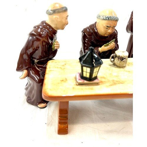 384 - 4 ceramic friars drinking and gambling sat by a ceramic table, tallest friar measures approximately ... 