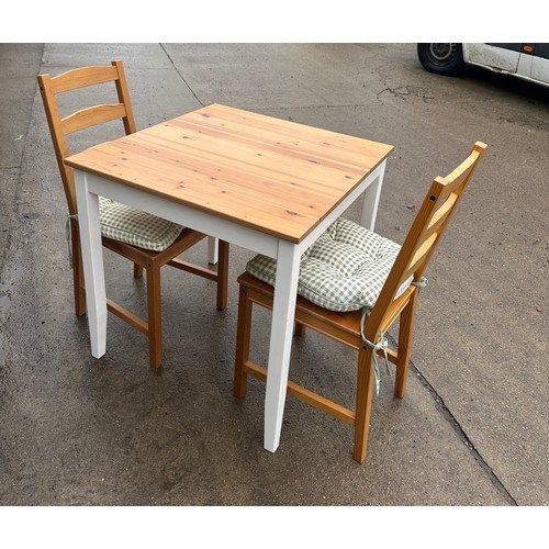 275 - Pine table and two chairs