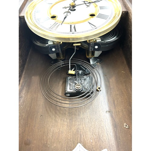 97 - 2 Keyhole wall clock, untested