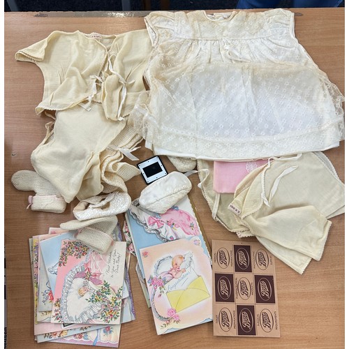 113 - Vintage baby clothing in a box