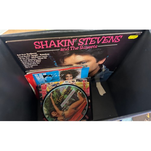 305 - Selection of assorted records includes Shakin Stevens etc