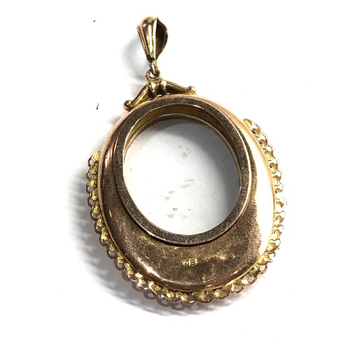 563 - 9ct gold vintage oval double sided locket (4.5g)