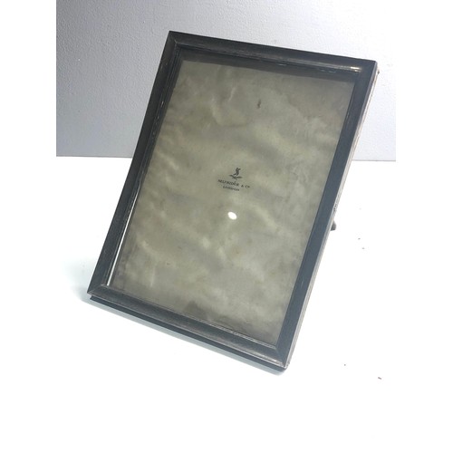 430 - Antique hallmarked silver picture frame retailed by Selfridge London measures approx 22.5cm by 17.5c... 