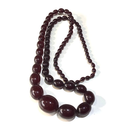 529 - cherry amber /bakelite type bead necklace no internal streaking weight 95g