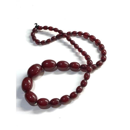 527 - Cherry amber bakelite bead necklace 52g no internal streaking