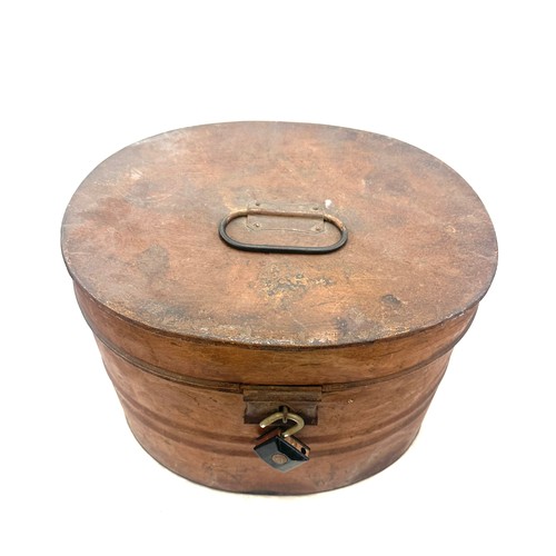 82 - Vintage metal hat box measures approximately 12 inches tall by 12 inches wide