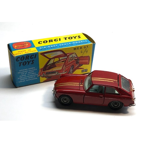 391 - Original boxed corgi 327 M.G.B  G.T in good as shown condition please see images for condition