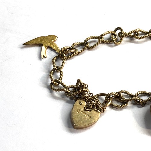 546 - 9ct gold charm bracelet heart padlock (10.1g)