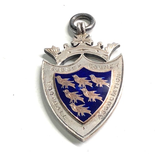 605 - Silver & enamel football fob